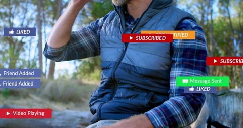 Man holding smartphone in forest with social media notifications, outdoor lifestyle tech