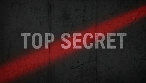 Top secret stencil on cracked concrete panel with red diagonal streak, grunge typography