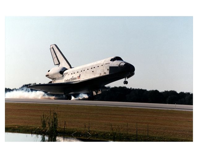 The Space Shuttle orbiter Atlantis touches down on Runway 33 at 9:22:44 a.m. EST Jan. 22 to conclude the fifth Shuttle-Mir docking mission and return NASA astronaut John Blaha to Earth after four months in space. Blaha was replaced by STS-81 Mission Specialist Jerry Linenger during the five days of docked operations. At main gear touchdown, the STS-81 mission duration was 10 days, 4 hours, 55 minutes. This was the 34th KSC landing in Shuttle history. Mission Commander Michael A. Baker flew Atlantis to a perfect landing, with help from Pilot Brent W. Jett, Jr. Other returning STS-81 crew members are Mission Specialists John M. Grunsfeld, Peter J. K. "Jeff" Wisoff and Marsha S. Ivins. Atlantis also brought back experiment samples from the Russian space station for analysis on Earth, along with Russian logistics equipment