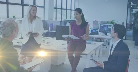 Diverse Business Meeting in Modern Office with Digital Concepts