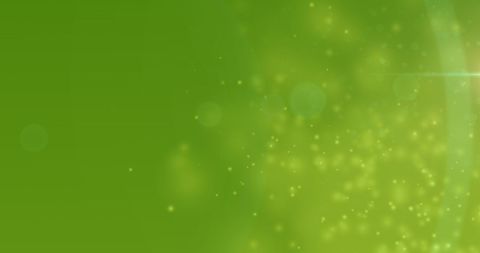 Glowing Yellow Particles on Vibrant Green Background