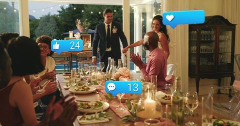 Bride and Groom Entering Reception Applauding Guests at Candlelit Long Table Poolside