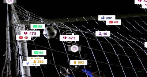 Scoreboard Overlays on Soccer Net Under Night Sky