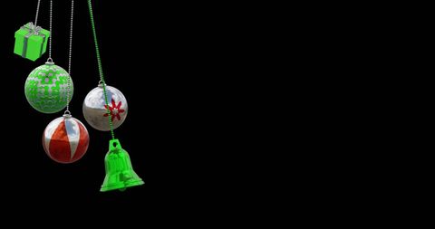 Vibrant Christmas Ornaments Hanging on Black Background