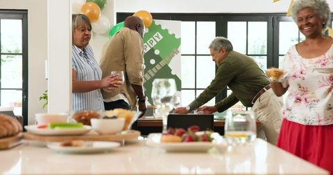 Diverse Seniors Celebrating Retirement with Friends