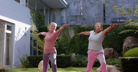 Senior Women Enjoying Outdoor Yoga for Wellness