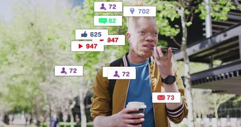 Casual Man Engaging Online Via Smartphone in Urban Park