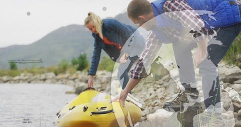 Friends Ready for Kayaking Adventure on Scenic Lakeshore