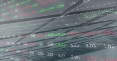 Blurred and overlayed stock market display in modern architecture
