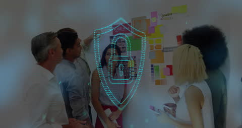 Team Collaborating on Strategy with Digital Security Overlay