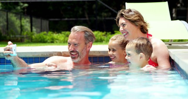 Happy Family Enjoying Summer Vacation in Swimming Pool - Download Free Stock Images Pikwizard.com