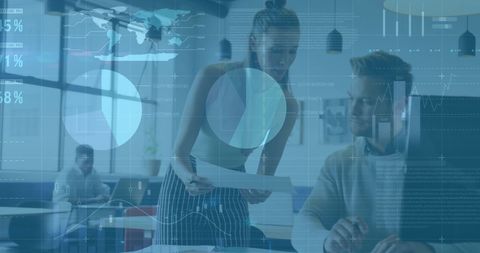 Colleagues discussing work with digital data overlay, futuristic office concept