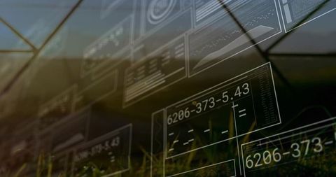 Digital data panels hovering above grass field in futuristic setting