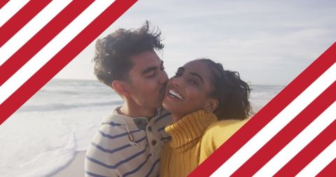 Diverse Couple Kissing by Sea with USA Flag Elements - Download Free Stock Images Pikwizard.com