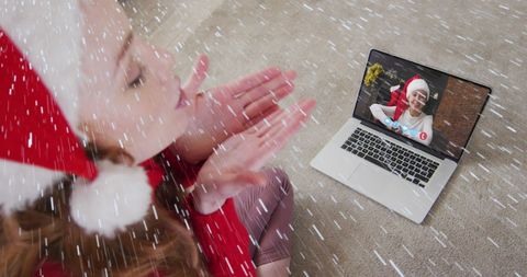 Virtual christmas video call celebration with family in snowy ambiance