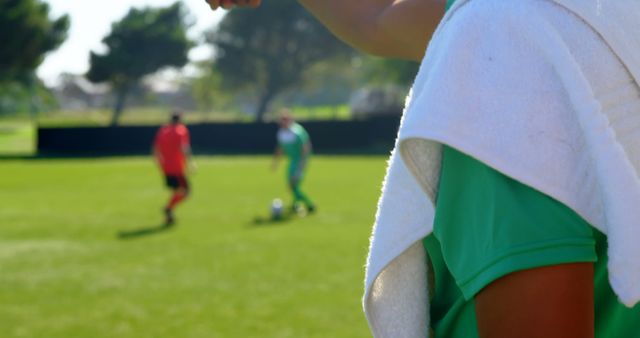 Soccer Referee Watching Players on Field During Game - Download Free Stock Images Pikwizard.com