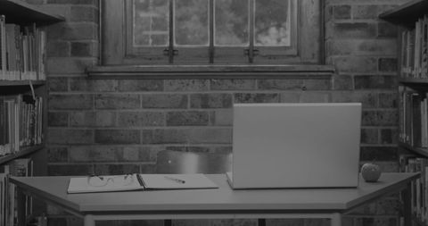 Laptop and Study Essentials on Desk in Quiet Library - Download Free Stock Images Pikwizard.com