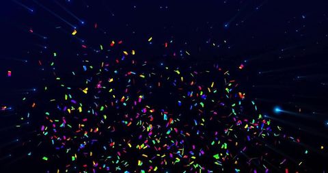 Swirling multicolor confetti cloud with glowing blue streaks and depth effect for celebration
