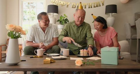 Seniors Celebrating Birthday at Home Sharing Joyful Moment