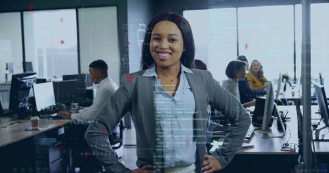 Confident businesswoman leading in modern office environment