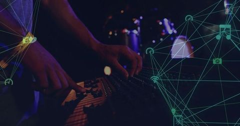 Live sound engineer adjusting mixer with teal network overlay at club performance