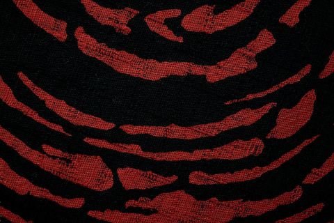 Crimson Tiger-Stripe Textile Texture on Black Woven Canvas for Bold Design
