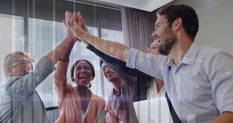 Diverse Team High-Fiving to Celebrate Successful Achievement