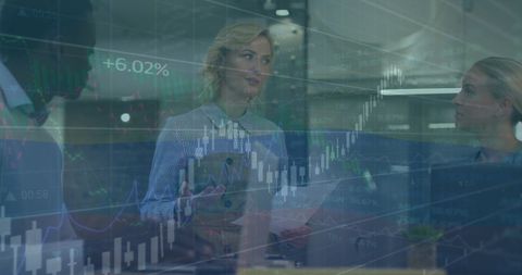 Financial overlay with business professionals in modern office