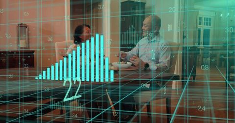 Mature couple sharing cozy dinner at home with teal data overlay and rising chart