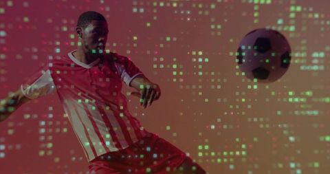 Kicking soccer player performing dynamic strike with pixelated green digital overlay