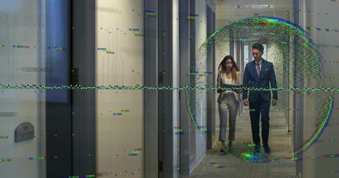 Business colleagues walking in modern office with digital glitch overlay