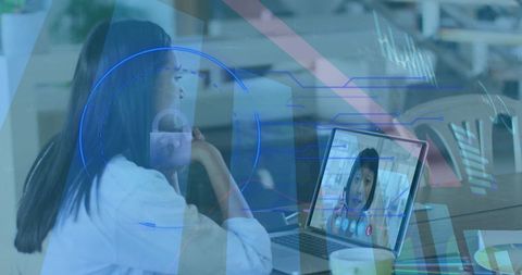 Businesswoman engaged in virtual call with futuristic data overlay