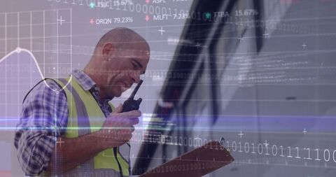 Construction worker analyzing digital data overlay on site