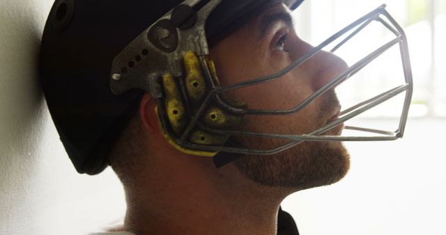 Contemplative Baseball Player Wearing Helmet - Download Free Stock Images Pikwizard.com