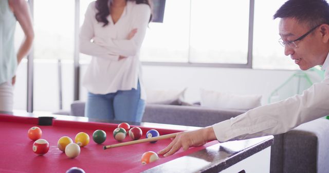 Office Colleagues Playing Billiards During Break - Download Free Stock Images Pikwizard.com