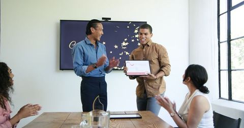 Diverse Team Celebrating Success with Employee Recognition