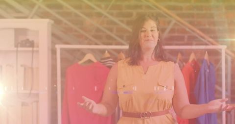 Female vlogger engaging with audience in stylish home studio