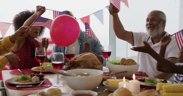 Family Celebrating Fourth of July with Dinner and American Flags - Download Free Stock Images Pikwizard.com