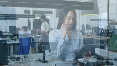 Diverse Business Professional Using Tablet in Modern Office