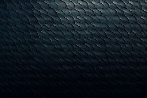 Dark textured surface with abstract design pattern