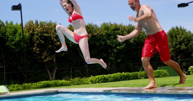 Father and Daughter Enjoying Pool Jump on Sunny Day - Download Free Stock Images Pikwizard.com