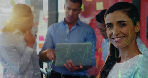 Innovative Business Team Analyzing Financial Data with Technology