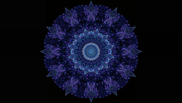 Digital neon mandala art on dark background