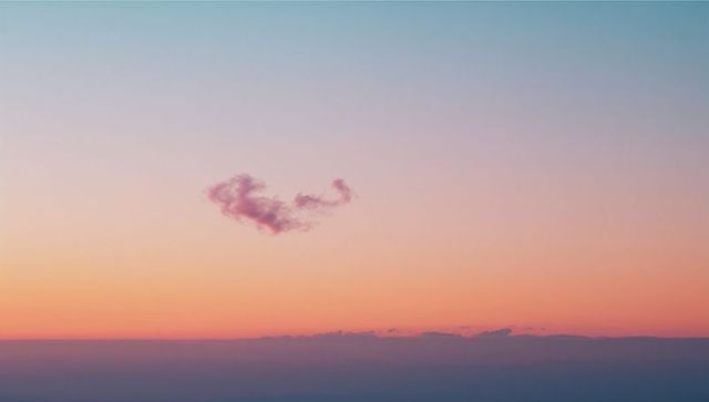 Pastel Skies with Floating Cloud in Calming Dawn Light