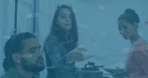 Diverse Team Collaborating on Data Analysis Project, Business Innovation