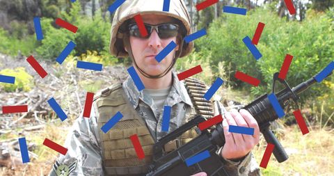 Soldier Celebrating with Patriotic Confetti Outdoors