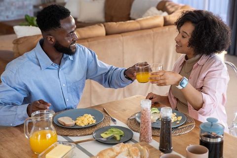 Morning Toast to Begin the Day Together at Cozy Breakfast Table