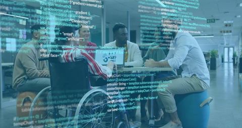 Diverse team brainstorming in modern office with wheelchair