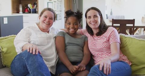 Happy Lesbian Parents with African American Daughter