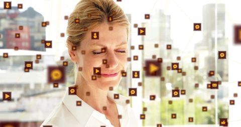 Professional Woman Surrounded by Digital Communications Icons